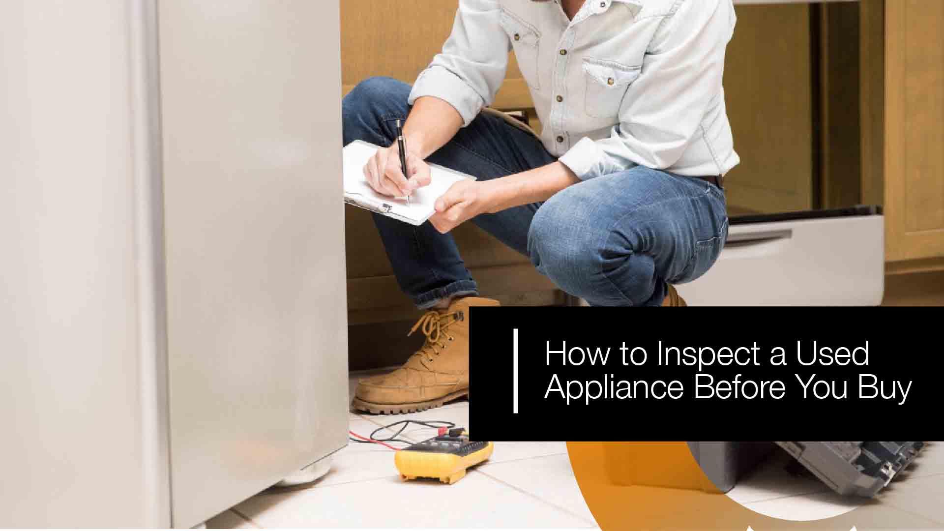 Buyer carefully inspecting a used household appliance before making a purchase.